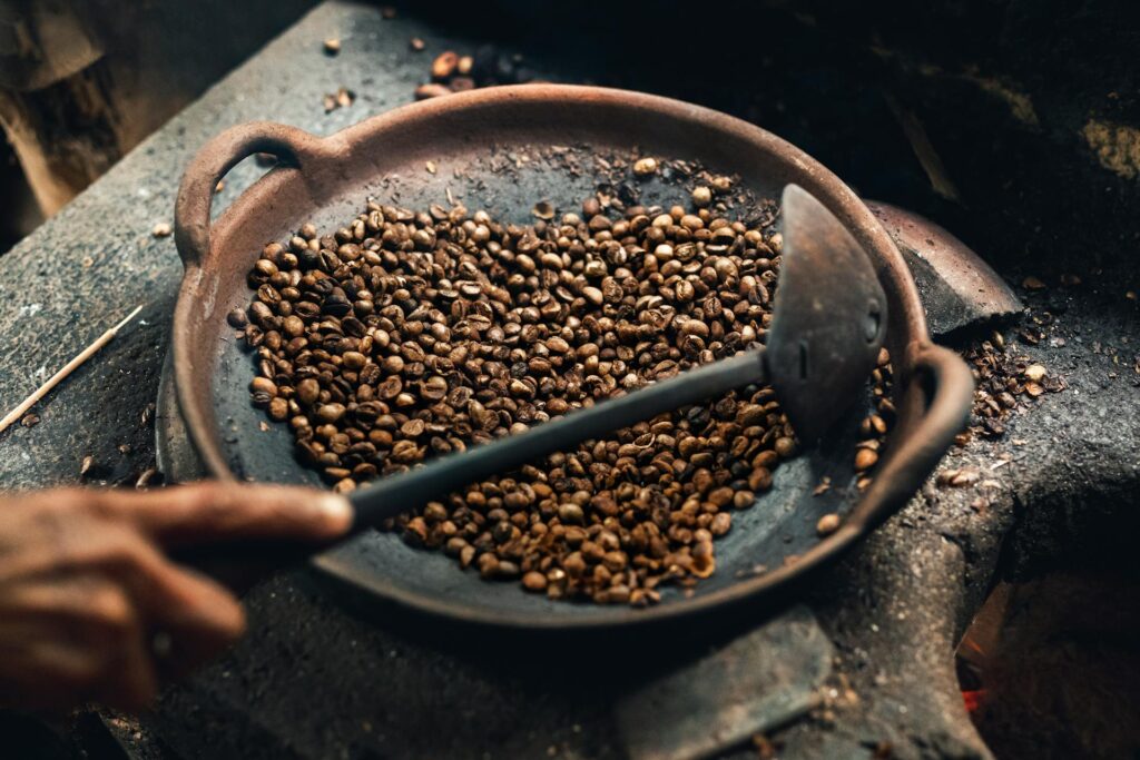 Exclusive Kopi Luwak coffee served with roasted beans.