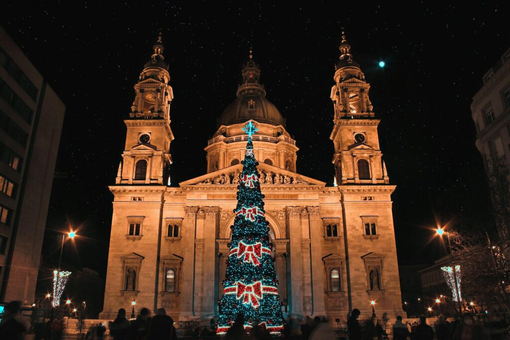 The Budapest Christmas Market at Vörösmarty Square with festive lights and traditional stalls.